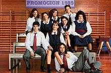 High-school seniors sitting on bleachers