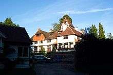 Very large white gabled house