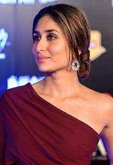 Kareena Kapoor smiling away from camera