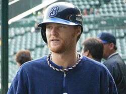 Dan Johnson in a batting helmet as a member of the Yokohama BayStars in 2009.